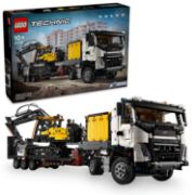 Obrázek Nákladní auto Volvo FMX a elektrický bagr Volvo EC230